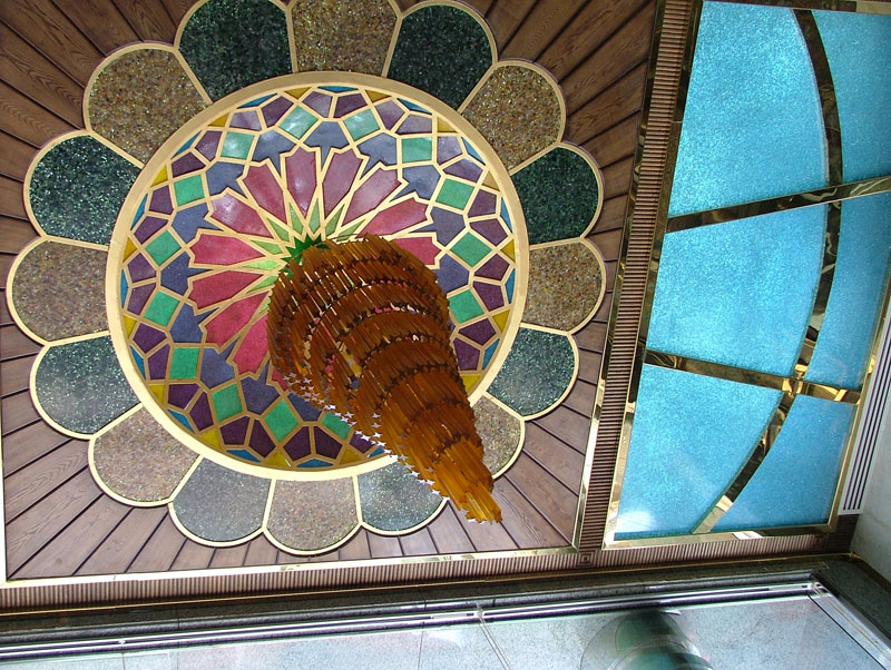 Bespoke mosaic ceiling and suspended metal feature